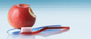 apple and toothbrush